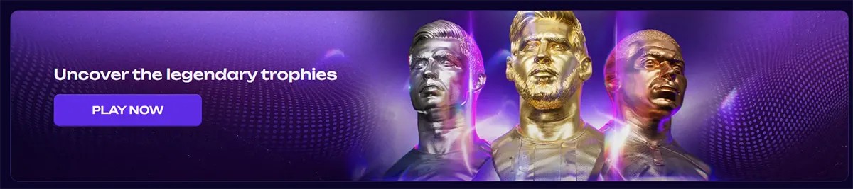 Promotional banner featuring metallic football player statues with a call to action to uncover legendary trophies and “Play Now” on a purple themed background